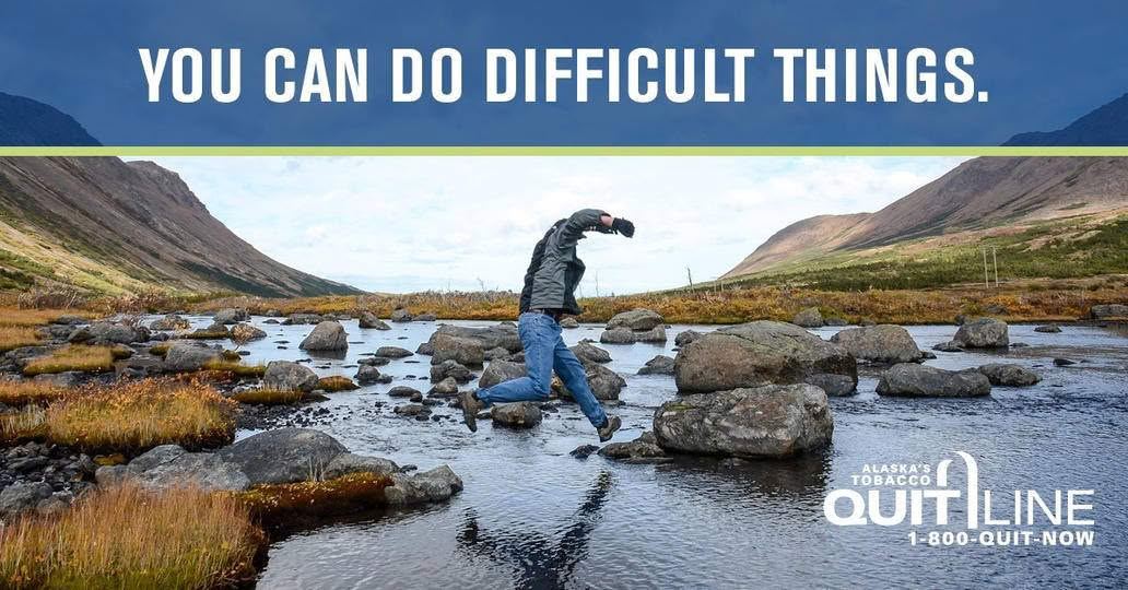 Man jumping on rocks by a river stream with the words “You can do difficult things.”
